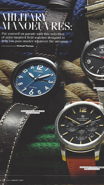 Three watches laid out on rope background